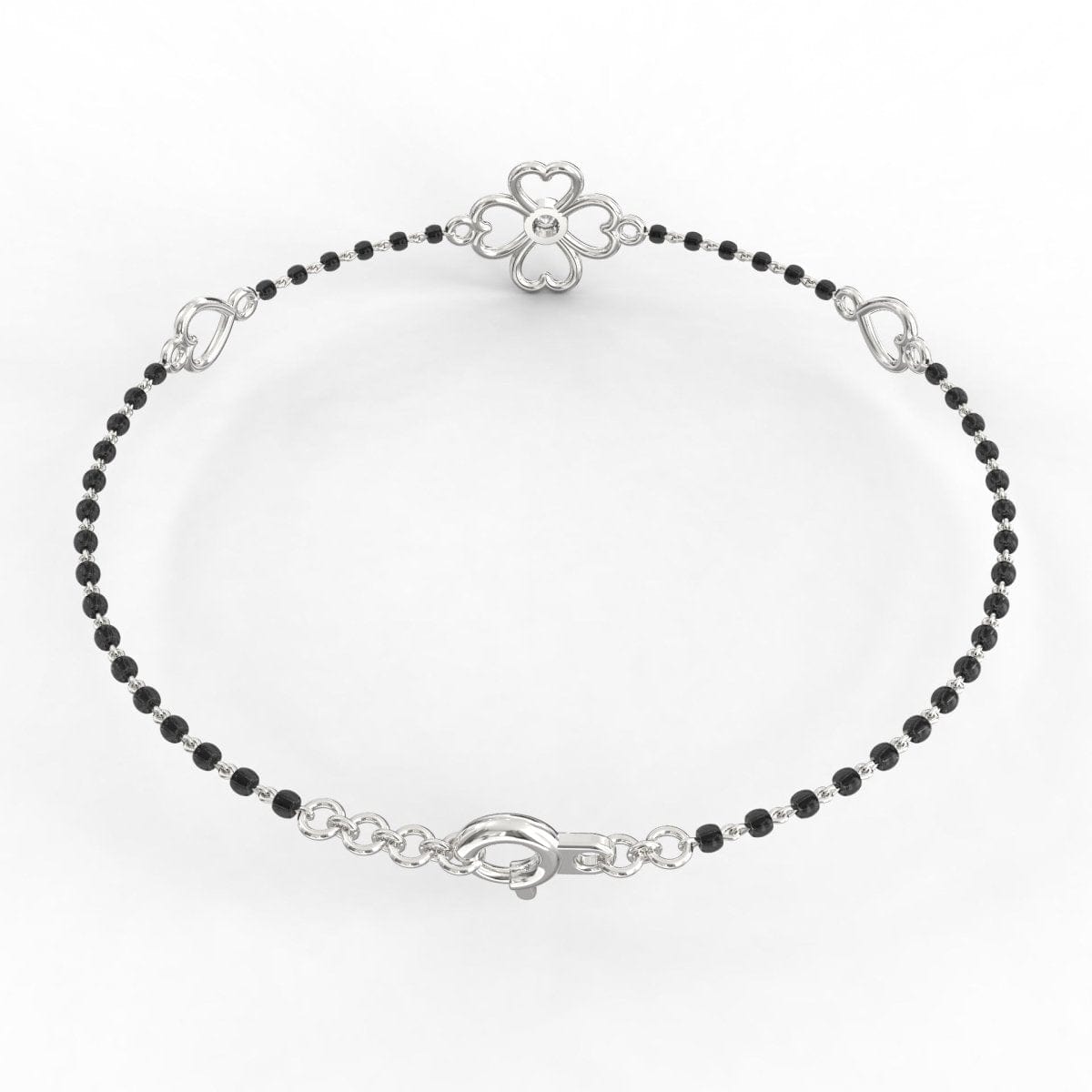 Back of Blossom Brilliance Circlet Mangalsutra Bracelet in white gold showing floral solitaire centerpiece, minimal black beads, and secure clasp.