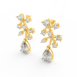 Angled view of yellow gold bloom earrings featuring polished petals and lab grown diamonds arranged symmetrically.

