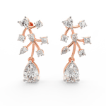 Front view of Aurelia rose gold floral earrings with polished petals and round lab grown diamonds arranged in bloom.
