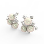 Angled view of white gold pearl bloom earrings featuring round lab grown diamonds and polished floral shape.
