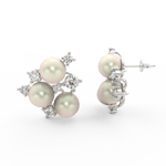 Side profile of white gold earrings with secure clasp, pearl centerpiece, and round lab grown diamond petals.
