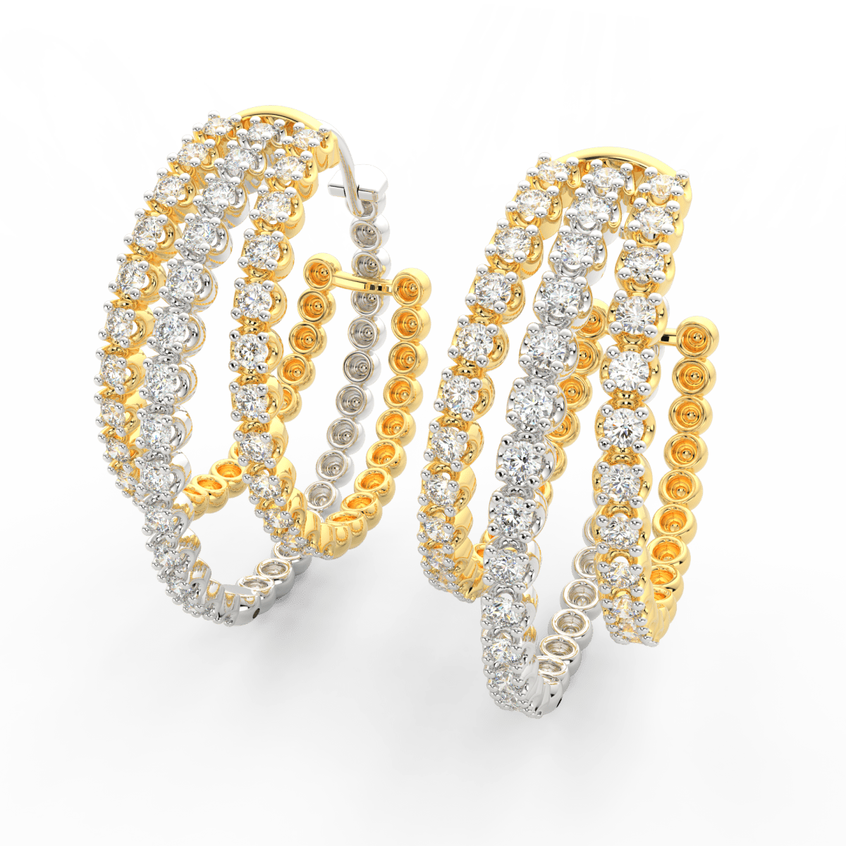 Angled view of yellow gold Aurora triple hoop earrings showcasing lab grown diamonds with staggered layered sparkle.
