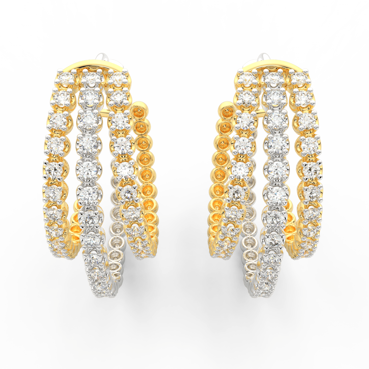 Top view of yellow gold triple hoop design highlighting lab grown diamonds on layered circular hoops.
