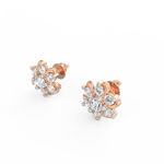 Angled view of rose gold earrings in petal-inspired design with lab grown diamonds.
