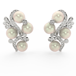 Front view of Celestia Pearl Bloom white gold earrings with luminous pearl center and lab grown diamond petals.
