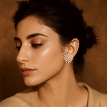 Model wearing Celestia yellow gold solitaire diamond earrings styled for daily elegance and radiant sparkle.

