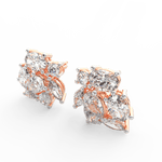 Angled view of rose gold Elira diamond ring showcasing contrasting pear and oval-cut lab grown diamonds.
