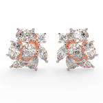 Front view of Elira rose gold diamond ring featuring pear and oval lab grown solitaires with sleek open-top design.
