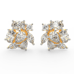 Front view of Elira yellow gold diamond ring featuring pear and oval-cut lab grown solitaires in open-top design.
