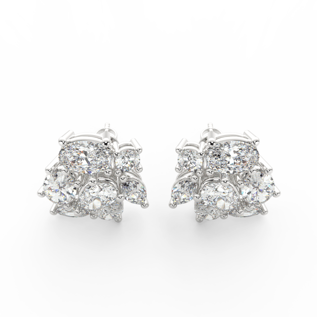 Top view of white gold Elira ring featuring pear and oval-shaped lab grown diamonds in elegant open-top setting.
