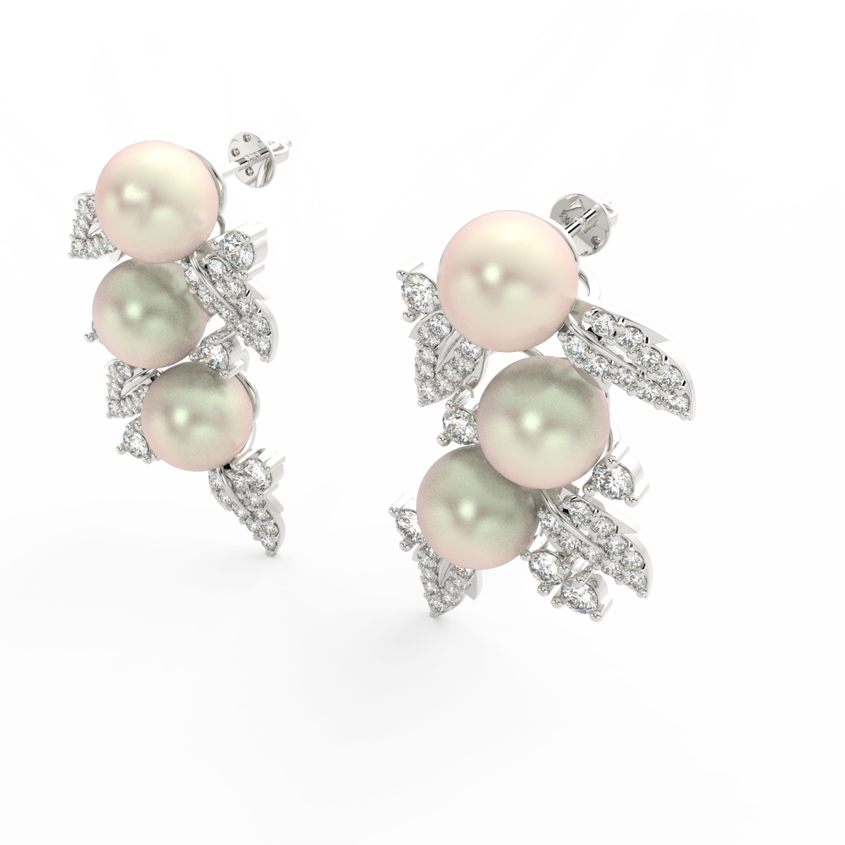 Angled view of white gold floral pearl earrings featuring polished surface and sparkling lab grown diamonds.
