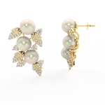 Side profile of yellow gold floral earrings with secure push-back clasp, pearl center, and lab grown diamonds.
