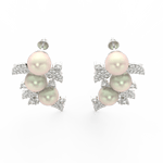 Top view showcasing white gold floral design with luminous pearl and surrounding lab grown diamonds.
