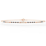 Side profile of rose gold mangalsutra bracelet featuring lab grown diamonds and rose gold finish with secure clasp.
