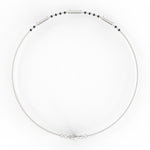 Top view of white gold mangalsutra bracelet highlighting polished diamond setting and black bead pattern.
