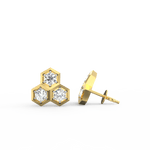 Side profile of yellow gold earrings with secure push-back clasp and comfortable fit.
