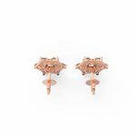Top view of rose gold solitaire studs with centered lab grown diamonds, elegantly handcrafted.
