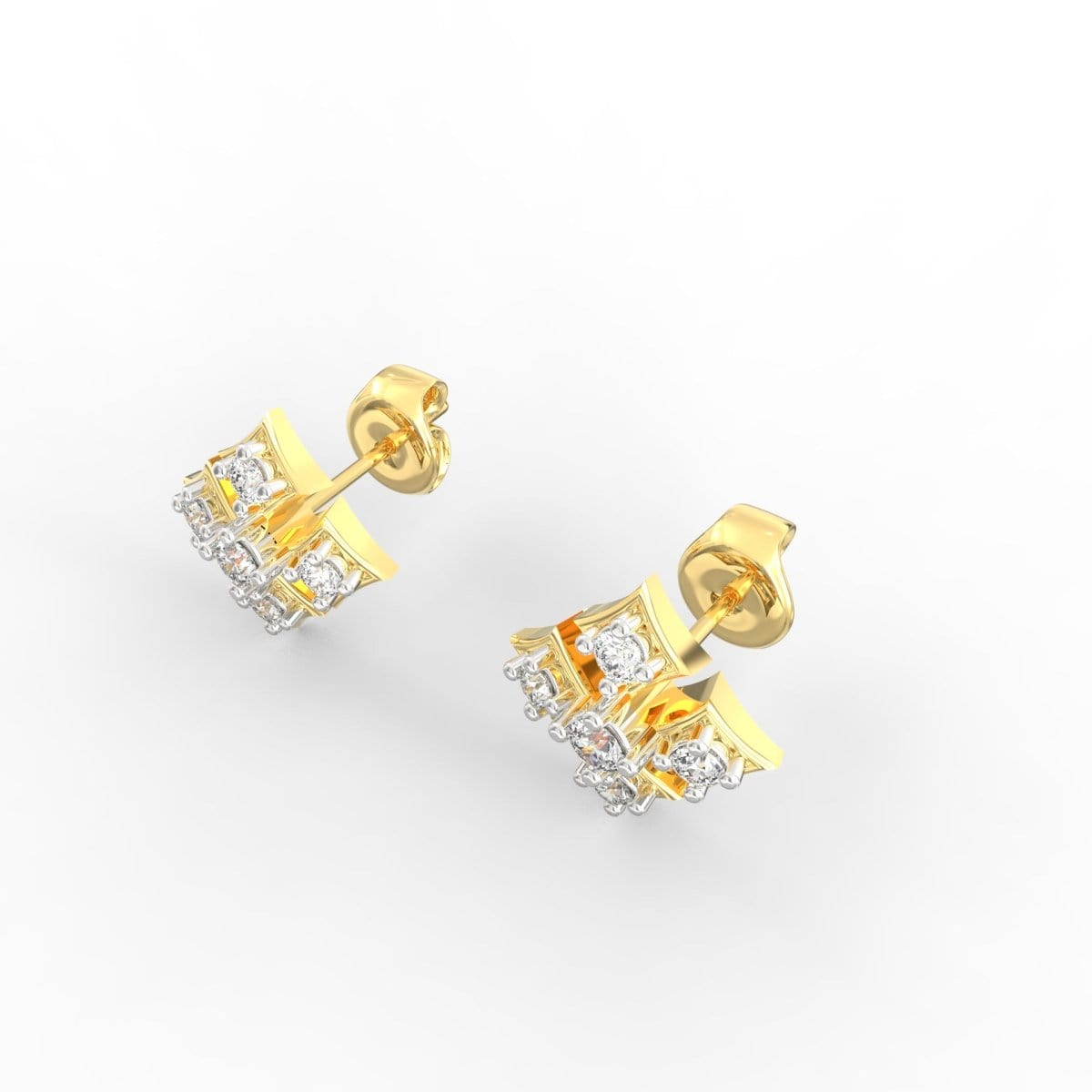 Angled view of yellow gold earrings with bezel-set diamonds for understated sparkle.
