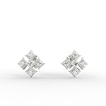Dainty round diamond earrings in white gold with lab grown stones, perfect for office or evening wear.
