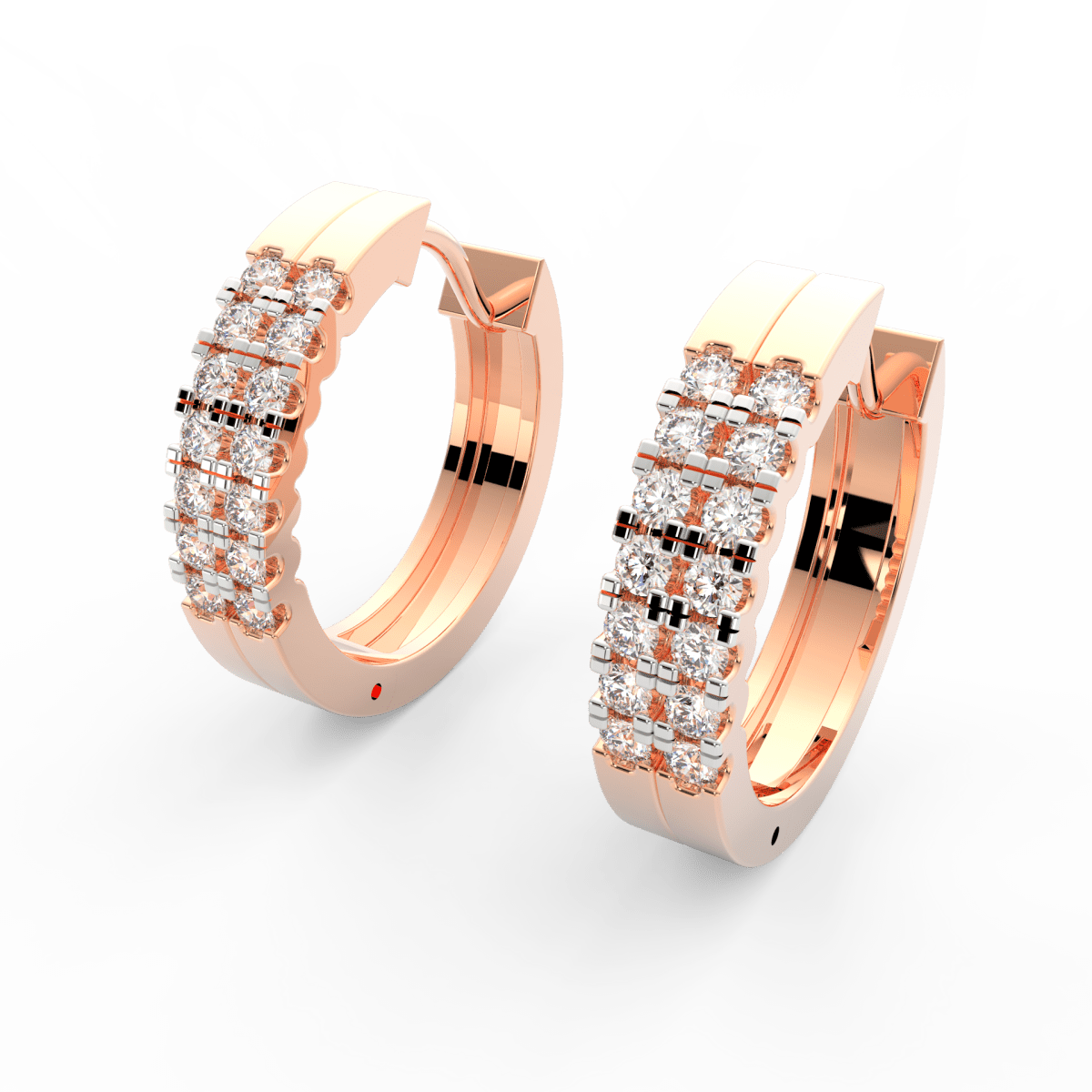Angled view of rose gold oval hoops showcasing polished finish and channel set lab grown diamonds.
