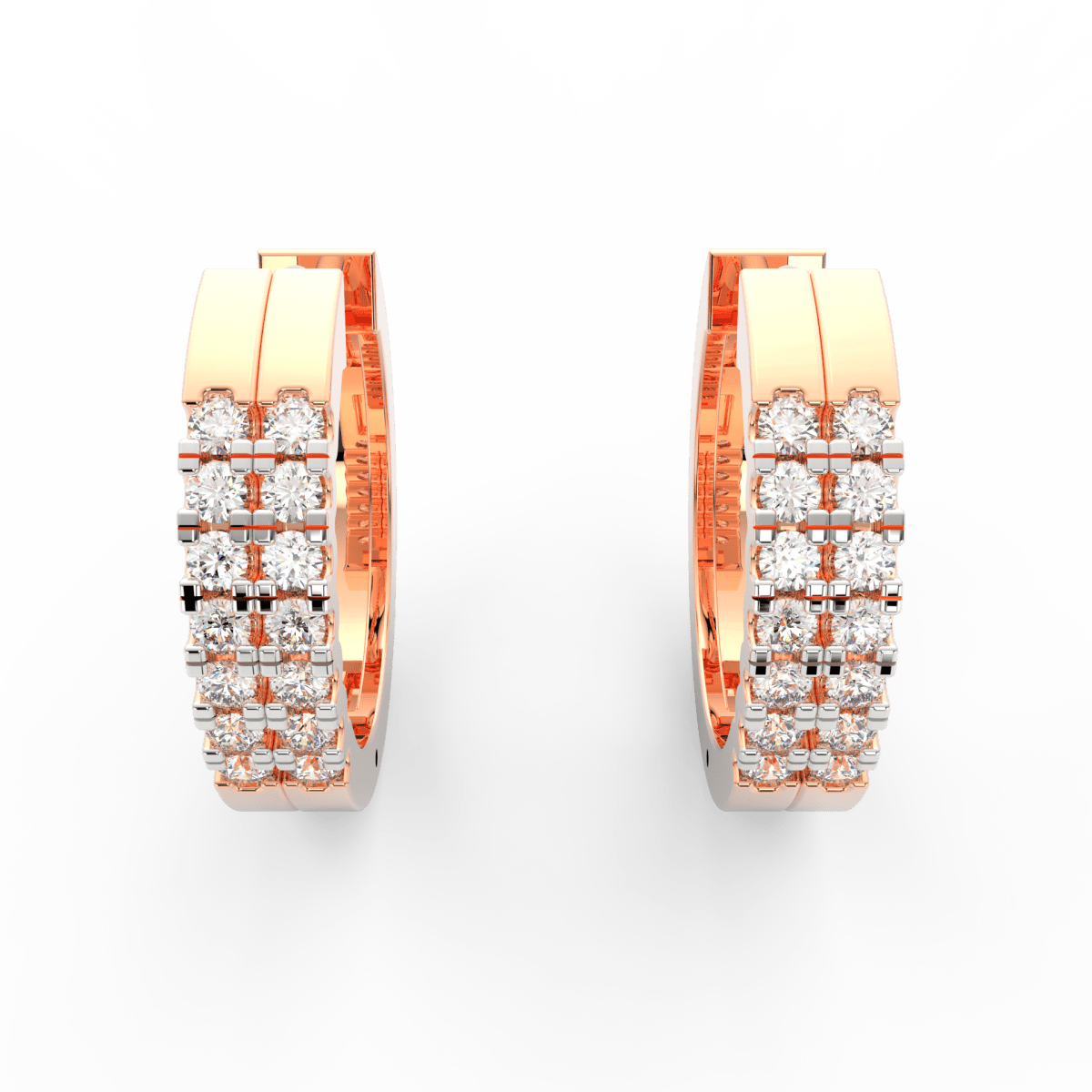 Top view of rose gold hoops highlighting channel set lab grown diamonds placed along the polished oval frame.
