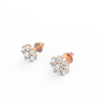 Angled image of rose gold round diamond earrings with shimmer texture and gentle finish.
