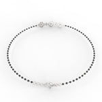 White Gold: Back view of Obsidian Glamour white gold mangalsutra bracelet highlighting secure lock mechanism and alternating diamonds with black beads on BIS Hallmarked white gold.

