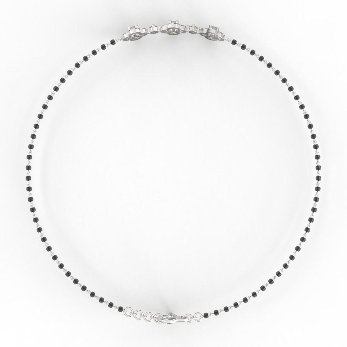 Top view of white gold Obsidian Glamour bracelet with alternating lab grown diamonds and traditional black beads.

