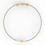 Top view of yellow gold Obsidian Glamour bracelet showing bold contrast between black beads and sparkling diamonds.
