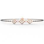 Rose Gold: Zoom view of Obsidian Glamour rose gold mangalsutra bracelet showing the smooth diamond and black bead combination on rose gold finish.

