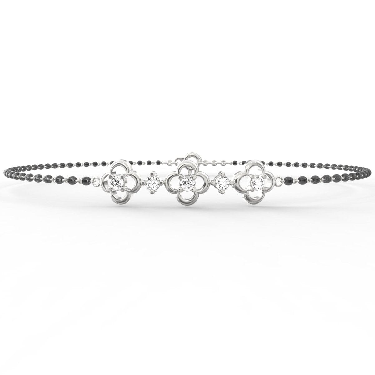 White Gold: Close-up of Obsidian Glamour white gold mangalsutra bracelet with sparkling lab grown diamonds and polished black beads set in white gold links.

