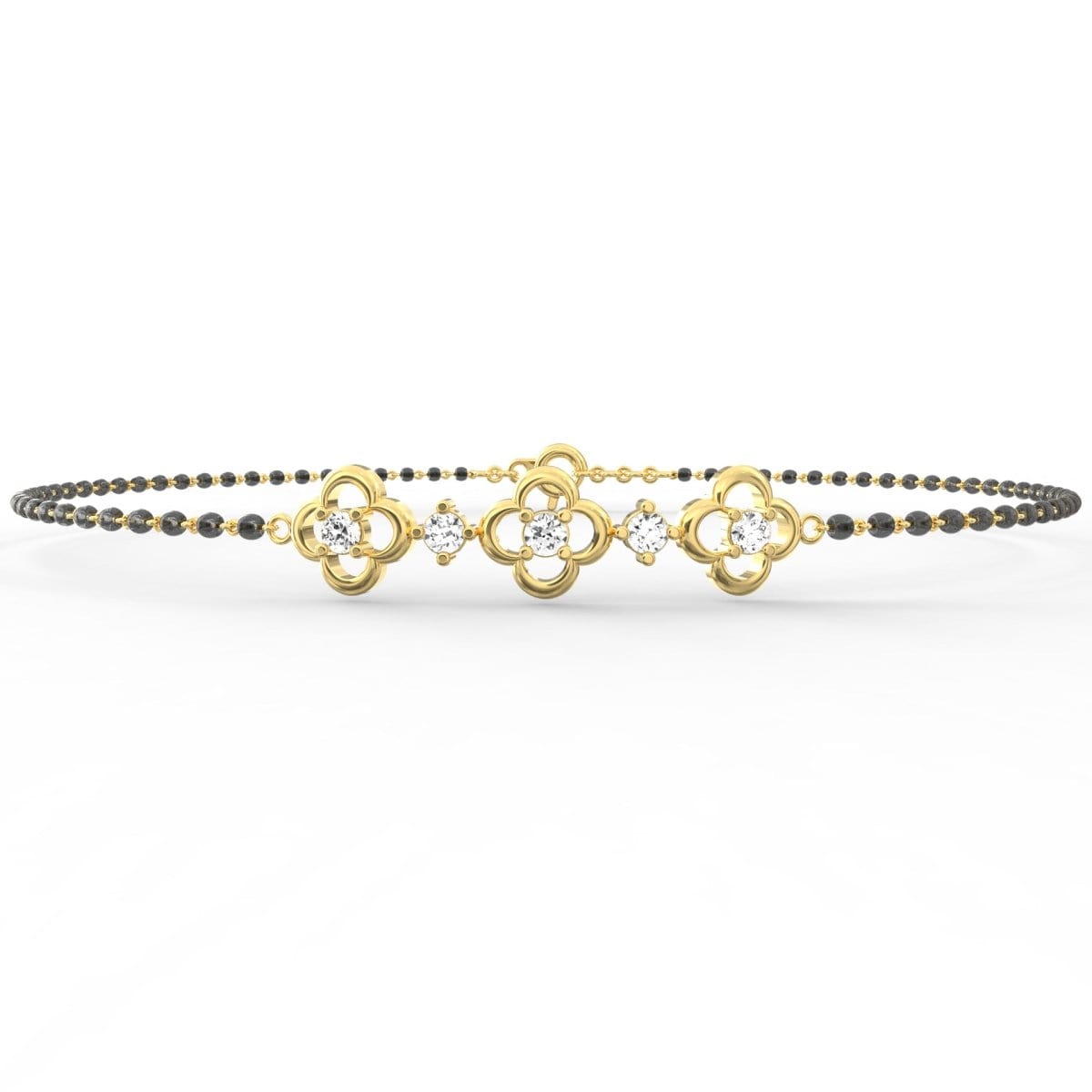 Yellow Gold: Close-up of Obsidian Glamour yellow gold mangalsutra bracelet highlighting polished gold links with alternating lab grown diamonds and black beads.

