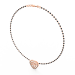 Angled view of rose gold mangalsutra showcasing balanced diamond cluster and traditional dual-bead chain.
