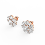 Angled image of rose gold diamond studs featuring minimalist design and soft brilliance.
