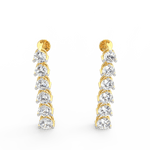 Angled view of yellow gold Radiant Symphony earrings showing layered drop design with sparkling lab grown diamonds.
