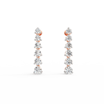 Front view of Radiant Symphony rose gold diamond drop earrings with cascading layers of lab grown diamonds.
