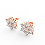 Angled view of rose gold floral diamond studs featuring round lab grown diamonds arranged like flower petals.
