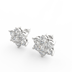 Angled view of white gold floral diamond studs featuring polished round bloom and lab grown diamonds.
