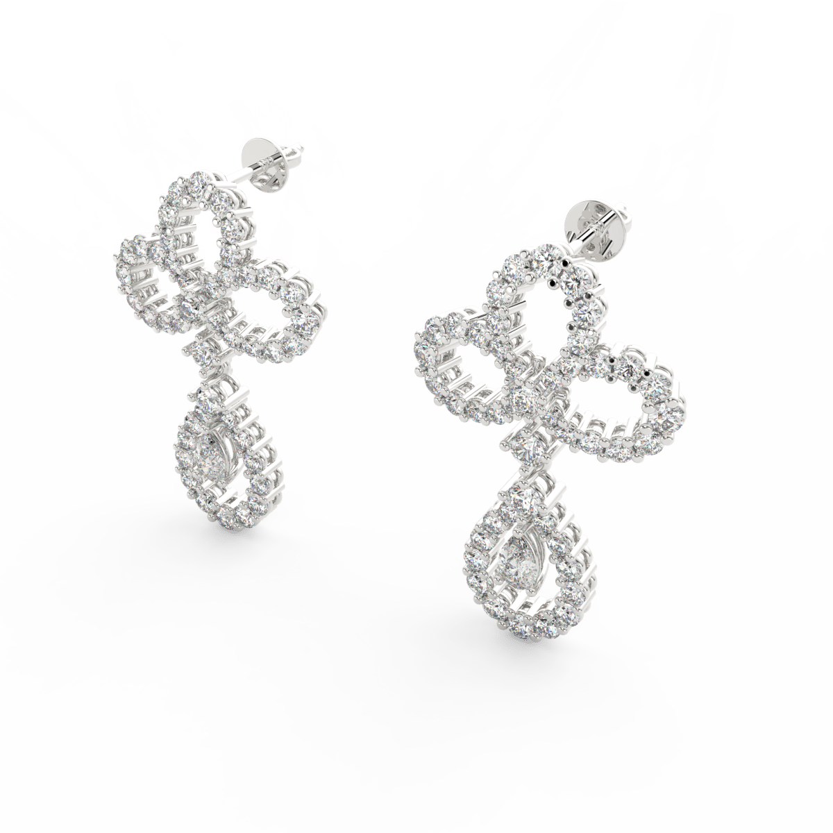 Angled view of white gold Seraphina earrings featuring polished drop silhouette with brilliant pear solitaire diamonds.
