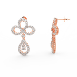 Side profile of rose gold drop earrings featuring secure hook clasp and elegant pear-shaped diamond drop.
