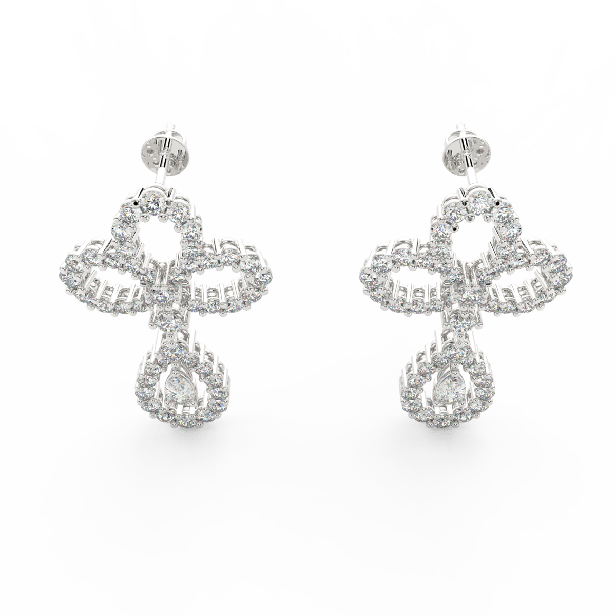 Top view of white gold earrings highlighting pear solitaire diamonds and polished drop design.
