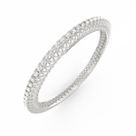 Glimpse of diamond-studded white gold bangle from an angled view.