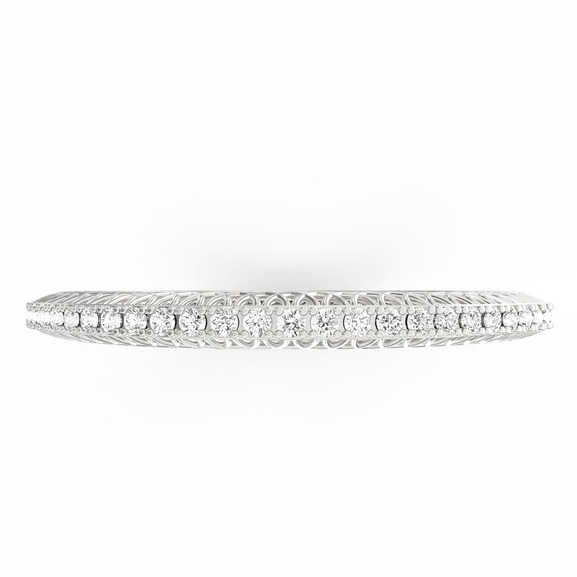 Overhead shot of diamond placement on white gold band.

