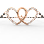 A rose gold bangle with ethically created diamonds, shown from the front.
