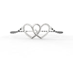 Elegant craftsmanship highlighted in the top of this white gold bangle.
