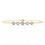 Yellow gold version of Elegant Radiance bracelet featuring a row of tiny lab grown diamonds.
