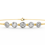 Top angle showcasing the fine chain design with subtle diamond placement on yellow gold.

